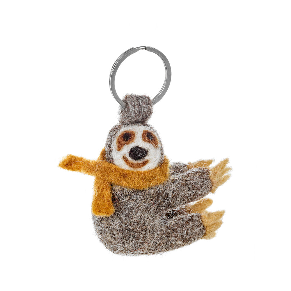 Slow down in style with this Felt So Good sloth key chain, sustainably crafted with a yellow scarf and plenty of charm.