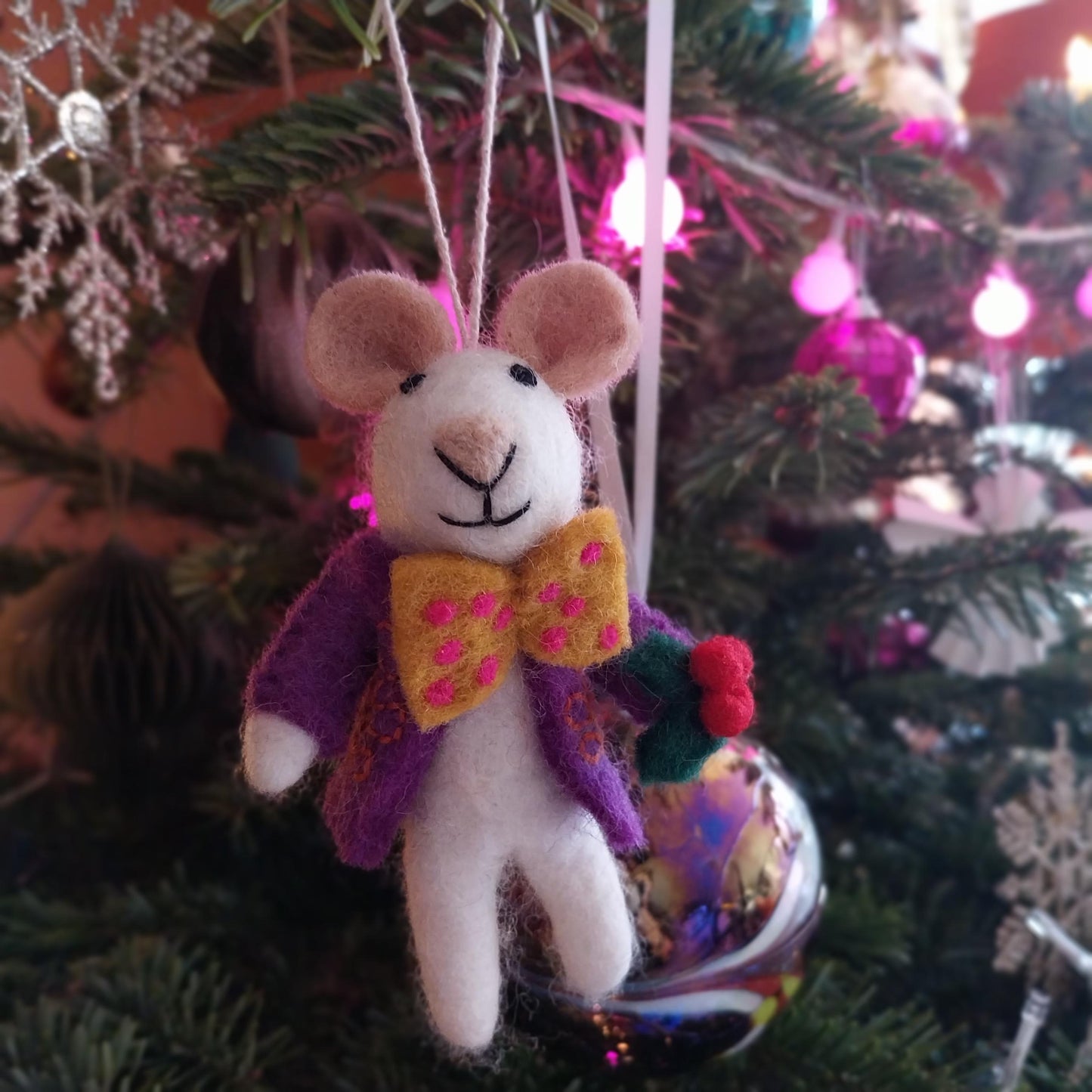 Felt So Good’s funky Jingle Whiskers Mouse is handmade in wool. A fair trade, eco-friendly Christmas decoration for your tree or as a festive present.
