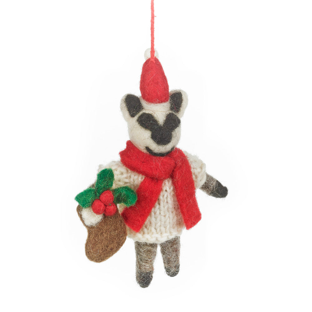 Handmade felt Christmas badger Noel in knitted jumper, scarf & Santa hat, holding a festive stocking. A fair trade wool tree decoration & gift.