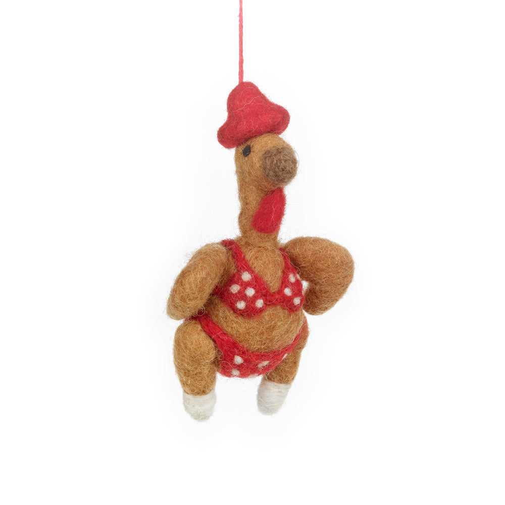 Handmade felt Christmas turkey in bikini & fedora. A quirky, fair trade wool tree decoration crafted sustainably by artisans in Nepal.