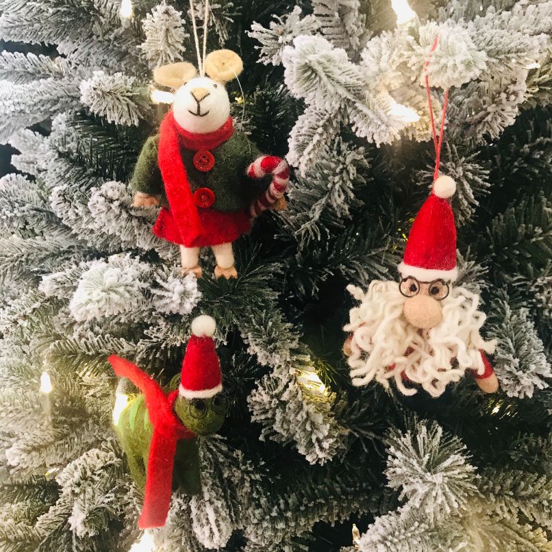 Felt So Good’s Curly Santa brings humour to your tree with his woolly beard & perm. A fair trade handmade Christmas decoration and unique gift.