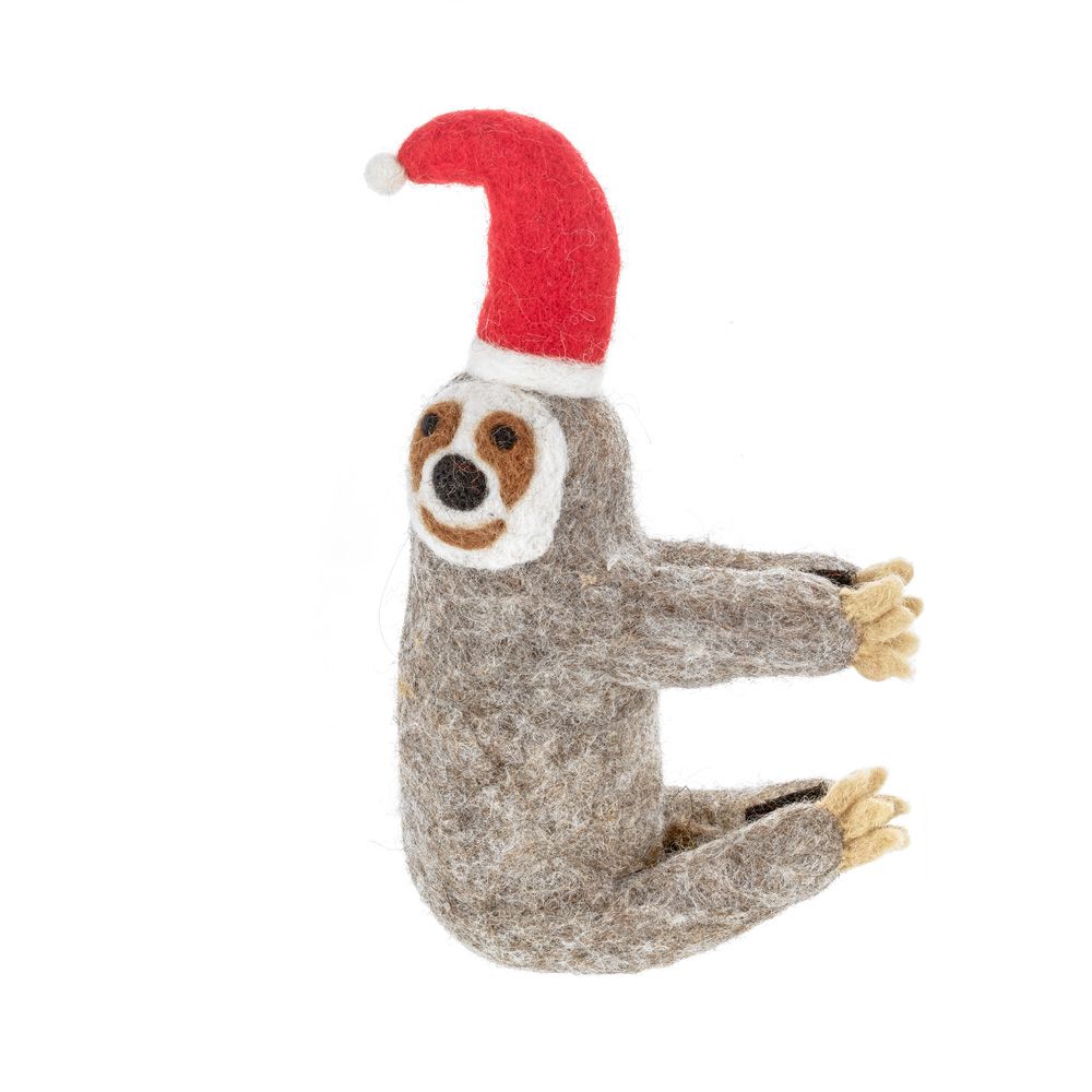 Top your Christmas Tree with Felt so good’s Christmas Sloth Tree Topper — a handmade felt Christmas decoration with hat, scarf, and festive charm.